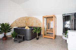 Posedenie v ubytovaní Csigaház Apartman