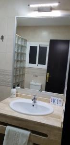 Łazienka w obiekcie Hostal Málaga