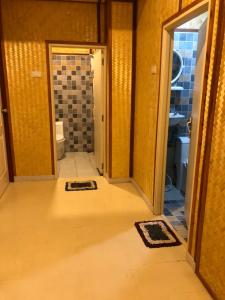 a bathroom with a walk in shower and a toilet at Rock View Terrace in Ko Jum