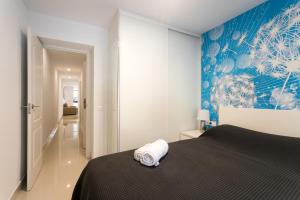 Ein Bett oder Betten in einem Zimmer der Unterkunft Calle San Carlos 132