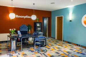 Khu vực sảnh/lễ tân tại City-Pension Dessau-Roßlau