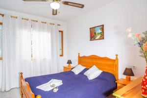 Postel nebo postele na pokoji v ubytování Villa Punta des Port Catorce