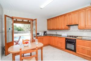 Kuchyň nebo kuchyňský kout v ubytování Villa Punta des Port Catorce