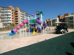 a water park with a playground with a water slide at Eco Resort Ilhas do Lago in Caldas Novas