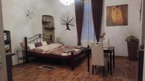 Posteľ alebo postele v izbe v ubytovaní Apartment Jakubská 676
