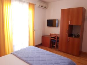 Ein Bett oder Betten in einem Zimmer der Unterkunft Pansion Villa Bok