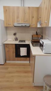 A kitchen or kitchenette at Serdika station, bright and cozy apartment