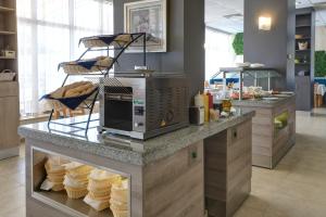 Een keuken of kitchenette bij Paraiso Theopolis - All Inclusive
