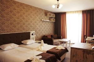 Een bed of bedden in een kamer bij Paraiso Theopolis - All Inclusive