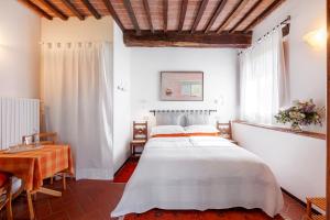 A bed or beds in a room at Agriturismo Apparita