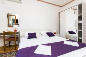 Cama o camas de una habitación en Apartments Petra