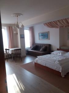 Postel nebo postele na pokoji v ubytování Apartmány Sedmikráska