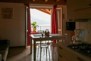 A kitchen or kitchenette at Residence La Collina