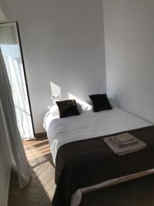 A bed or beds in a room at ALTEAMAR