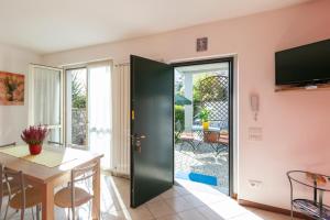 A television and/or entertainment centre at Residence La Collina