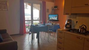 A kitchen or kitchenette at Residence La Collina