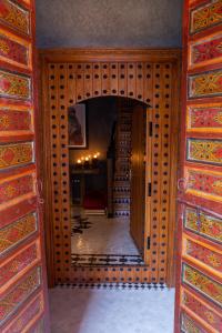an open door to a room with a hallway at Riad Touda in Marrakesh