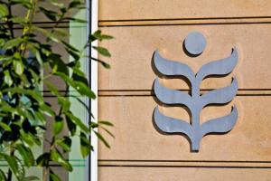 a metal symbol on the side of a building at Botanique Hotel Prague in Prague