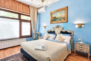 Postel nebo postele na pokoji v ubytování BB Venezia