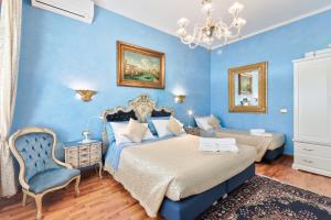 Postel nebo postele na pokoji v ubytování BB Venezia