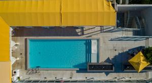 an overhead view of a swimming pool in a building at Leslie Hotel Ocean Drive in Miami Beach