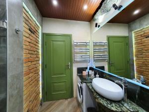 Ванная комната в T2&T3 Apartments LEVANTO