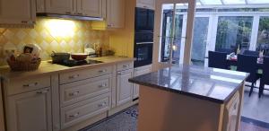 Dapur atau dapur kecil di Gîte de charme dans une maison bourgeoise +6 gambar
