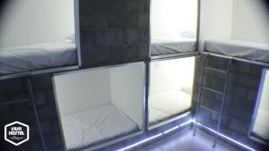 Кровать или кровати в номере Viva Hostel Design