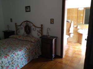 Postel nebo postele na pokoji v ubytování B&B Villa Le Palme Scalea