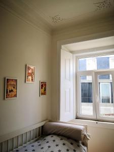 Uma cama ou camas num quarto em Mouraria Flat 1D by InsightHome