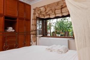 A bed or beds in a room at Abelos Villas