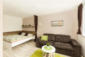 Postel nebo postele na pokoji v ubytování Apartmány Stožec - Nella Premium
