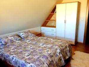 Postel nebo postele na pokoji v ubytování Apartman Aisha