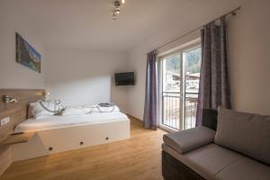 Postel nebo postele na pokoji v ubytování Ferienwohnung Thaler