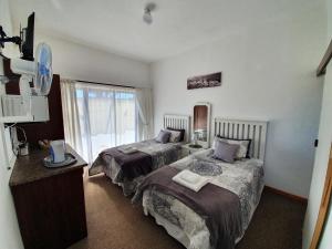 Postel nebo postele na pokoji v ubytování Karoo View Guesthouse Cradock
