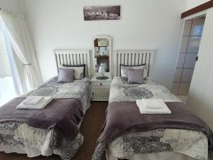 Postel nebo postele na pokoji v ubytování Karoo View Guesthouse Cradock
