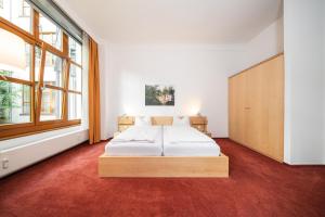 Ein Bett oder Betten in einem Zimmer der Unterkunft Hotel 26