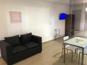 TV a/nebo společenská místnost v ubytování BOULEVARD DEPARTAMENTOS II