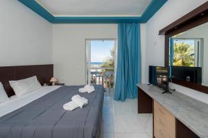 Voodi või voodid majutusasutuse Callinica Hotel toas