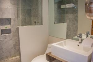Koupelna v ubytování Hotel Plaza Kokai Cancún