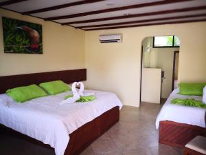 Postel nebo postele na pokoji v ubytování Arena Blanca Eco Hotel