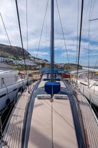 a sail boat docked in a marina at Boat Aiolis in the Athenian Riviera! in Athens