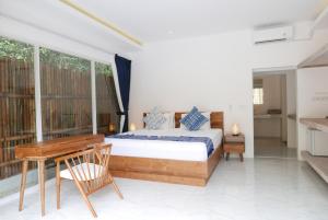 Postel nebo postele na pokoji v ubytování Seri Resort Gili Meno - Adults Only
