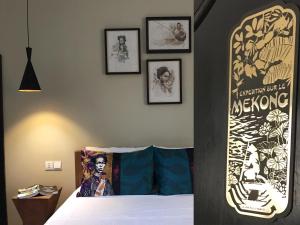 Postel nebo postele na pokoji v ubytování Hotel La Java Bleue