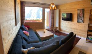 Ein Sitzbereich in der Unterkunft Boost Your Immo les Deux Alpes 183 / Le Janremon