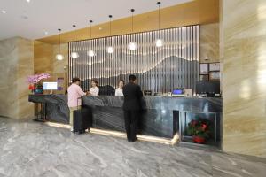 The lobby or reception area at Mengguo Hotel Pudong Airport
