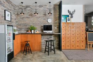 Kuchyň nebo kuchyňský kout v ubytování The Corner Lodge + 76 fotografií