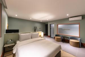 Postel nebo postele na pokoji v ubytování Brown Dot Hotel Seong Seo