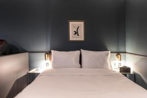 Postel nebo postele na pokoji v ubytování Brown Dot Hotel Seong Seo