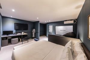 Postel nebo postele na pokoji v ubytování Brown Dot Hotel Seong Seo